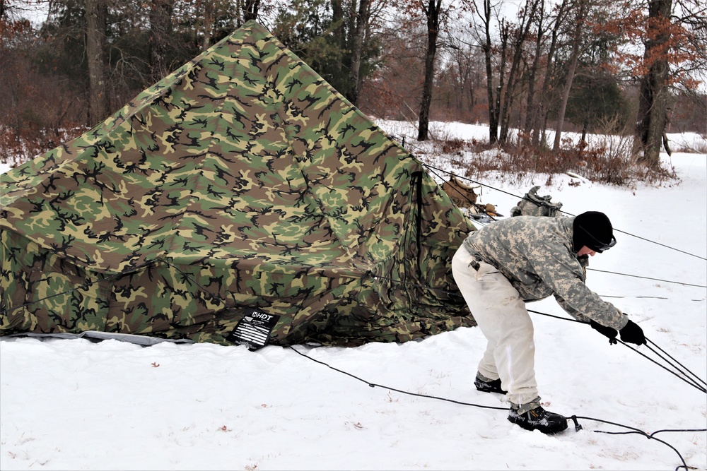 Cold-Weather Operations Course students practice use of Arctic 10-person tent at Fort McCoy