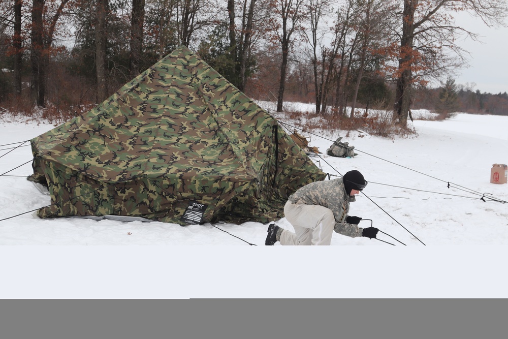 Cold-Weather Operations Course students practice use of Arctic 10-person tent at Fort McCoy