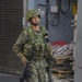 Japanese Soldier Prepares Weapons Aboard USS Pearl Harbor