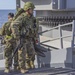 Japanese Soldier Prepares Weapons Aboard USS Pearl Harbor