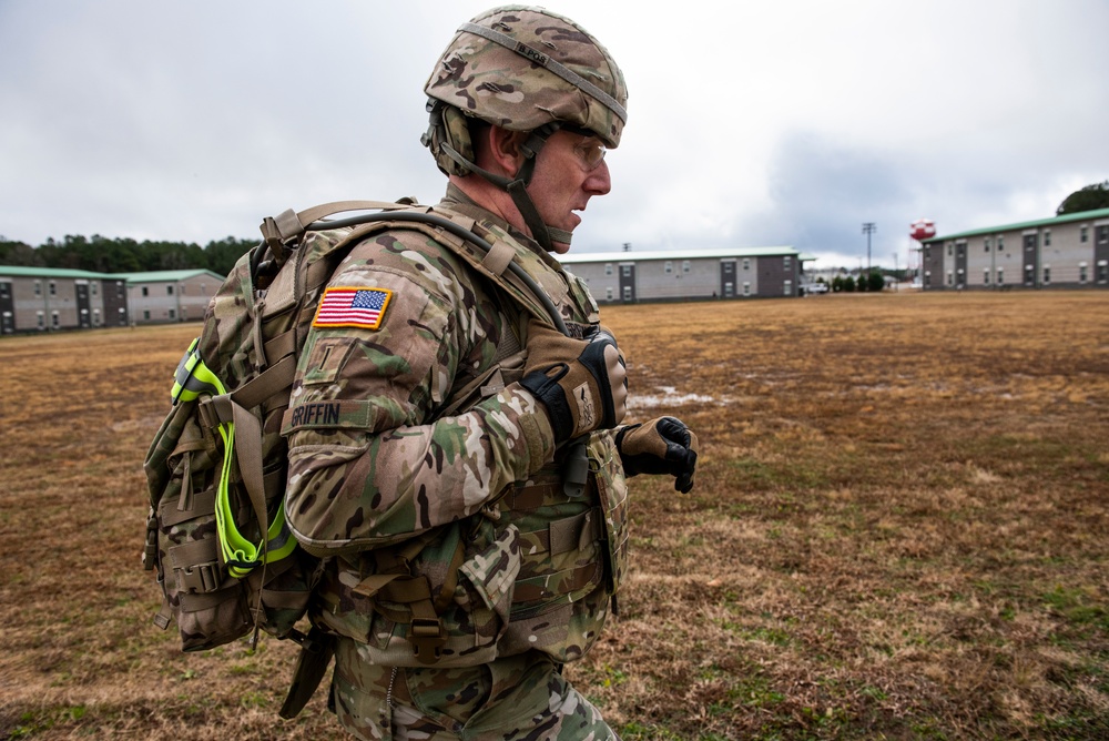 Warrant officer candidates ruck march for course requirement