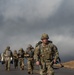 Warrant officer candidates ruck march for course requirement