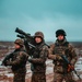 Polish and Romanian Soldiers work together to accomplish training tasks during eFP