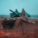 Polish and Romanian Soldiers work together to accomplish training tasks during eFP