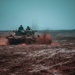 Polish and Romanian Soldiers work together to accomplish training tasks during eFP