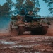 Polish and Romanian Soldiers work together to accomplish training tasks during eFP