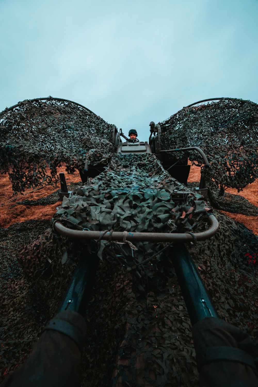 Polish and Romanian Soldiers work together to accomplish training tasks during eFP