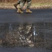 Warrant officer candidates ruck march for course requirement