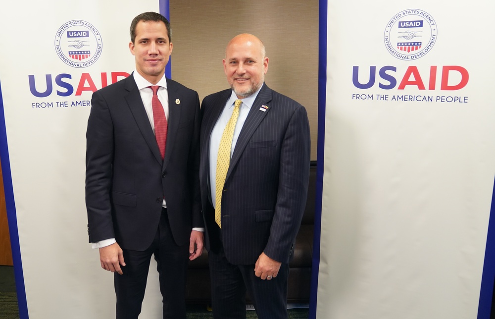 Venezuela Interim President Juan Guaido with United States Agency for International Development the Assistant Administrator for the Bureau of Latin America and Caribbean John Barsa.