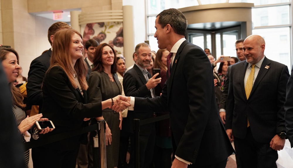 Venezuela Interim President Juan Guaido greets United States Agency for International Development staff