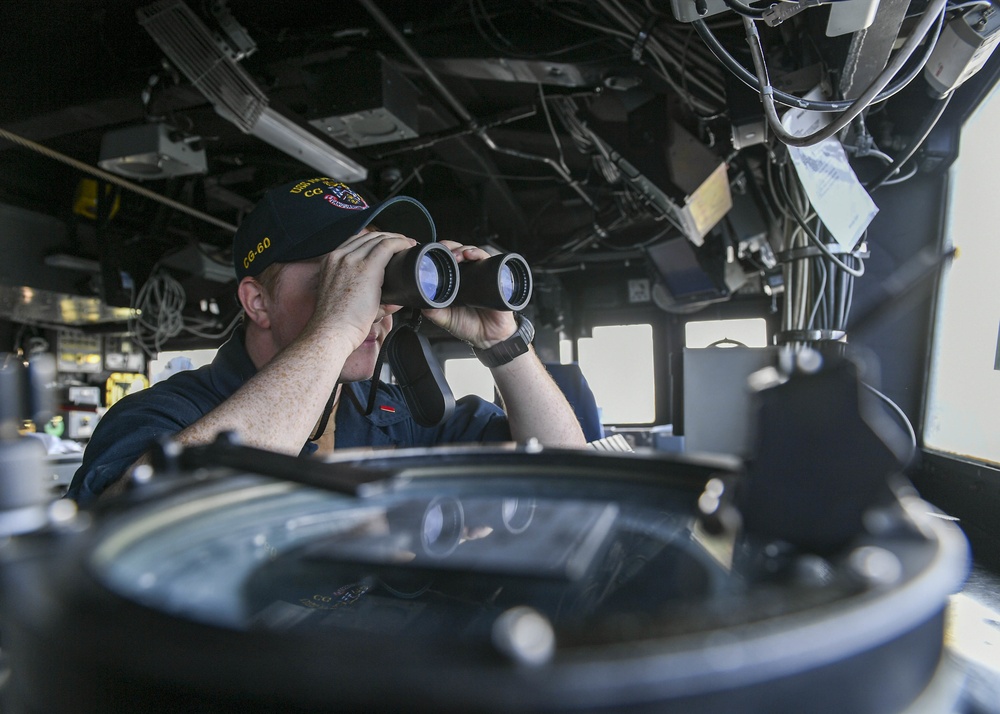 USS Normandy Sailor Looks For Surface Vessels