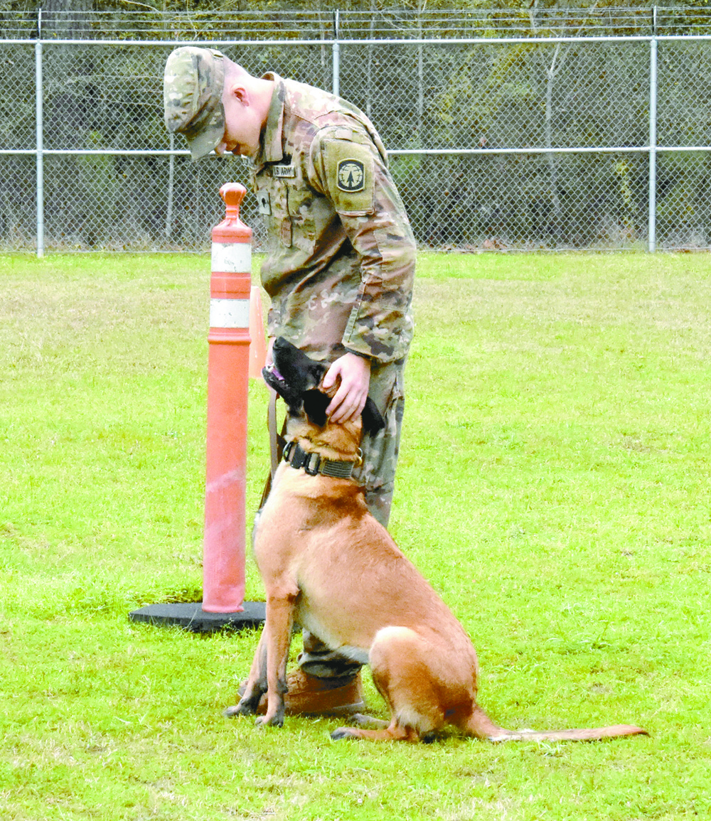 Dog handlers, man’s best friend develop special bond