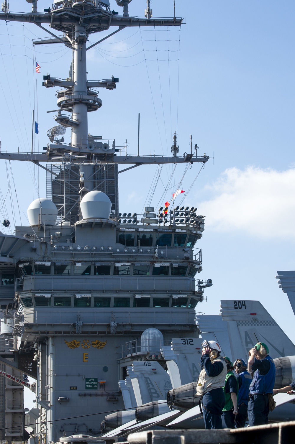 USS Harry S. Truman (CVN 75) conducts a replenishment-at-sea in the Arabian Sea