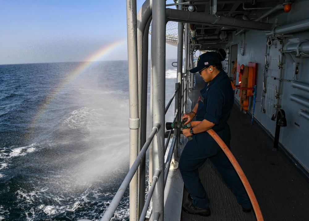 USS Normandy Sailor Performs Fire Pump Maintenance