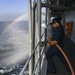 USS Normandy Sailor Performs Fire Pump Maintenance