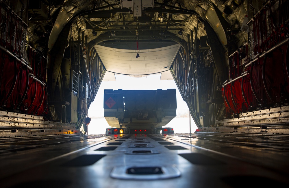 Marines load HIMARS into KC-130J