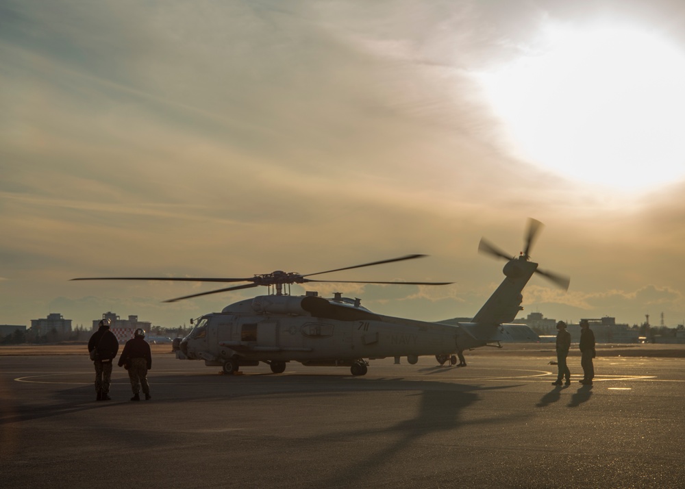 HSM-77 Helicopter Pilots Prepare for Take-off