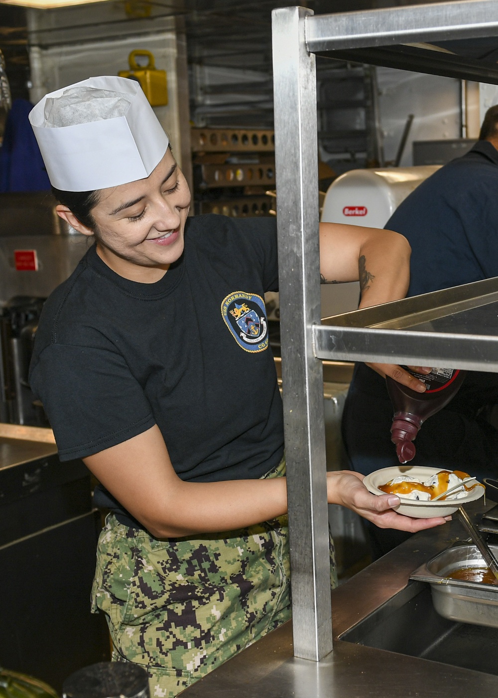 USS Normandy Sailor Serves Ice Cream