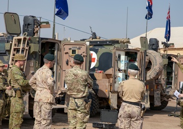Canadian Major General Jennie Carignan and British Major General Gerald Strickland visit Camp Taji