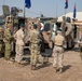 Canadian Major General Jennie Carignan and British Major General Gerald Strickland visit Camp Taji