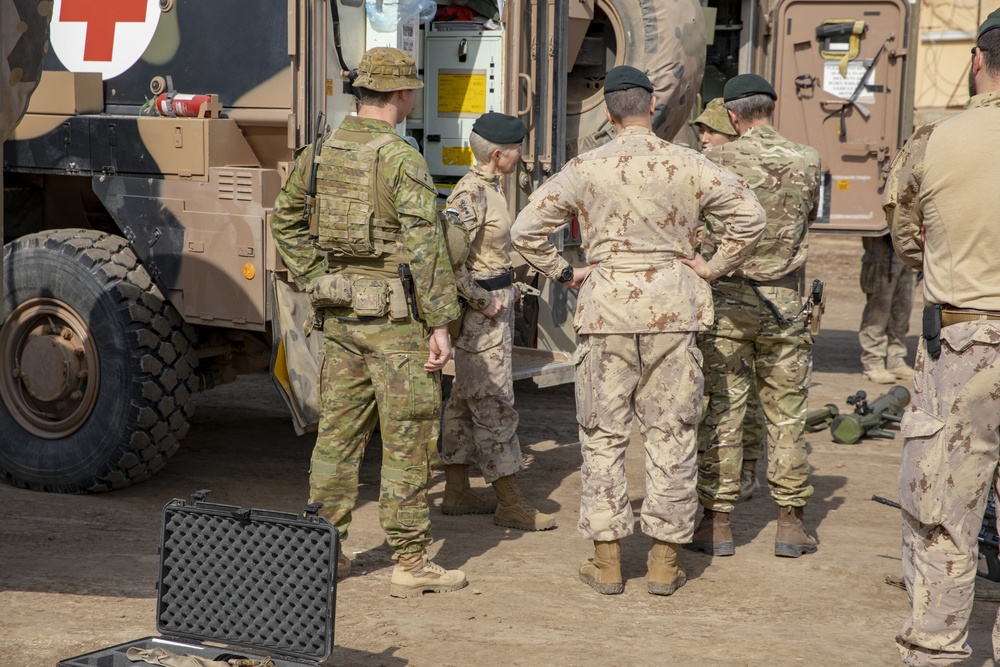 Canadian Major General Jennie Carignan and British Major General Gerald Strickland visit Camp Taji