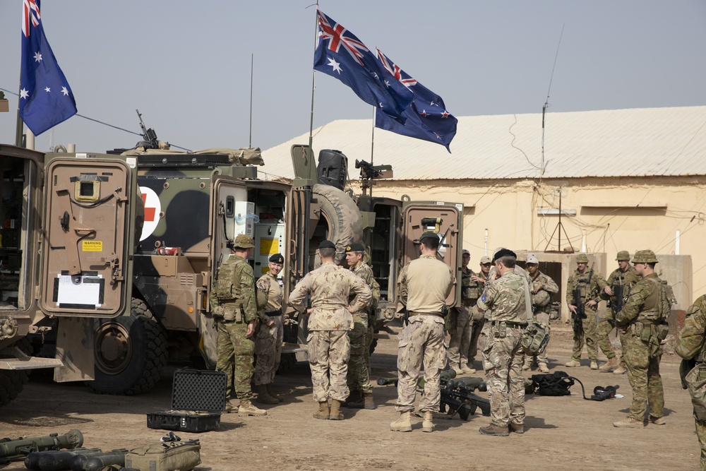 Canadian Major General Jennie Carignan and British Major General Gerald Strickland visit Camp Taji