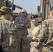 Canadian Major General Jennie Carignan and British Major General Gerald Strickland visit Camp Taji