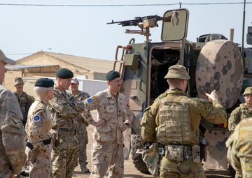 Canadian Major General Jennie Carignan and British Major General Gerald Strickland visit Camp Taji