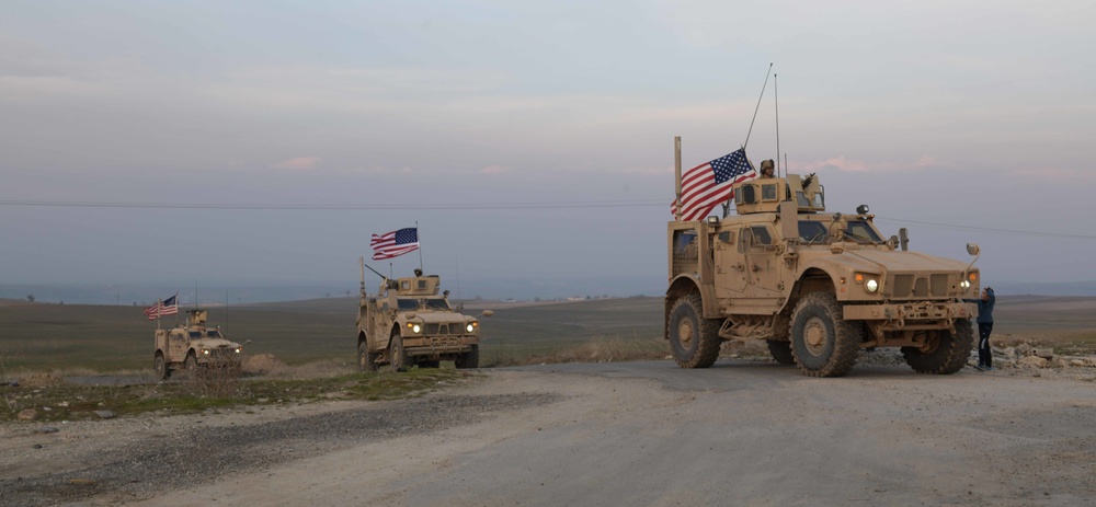 Child Greets U.S. Army Forces