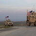 Child Greets U.S. Army Forces