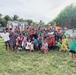 U.S. Navy Seabees with NMCB-5's Detail Marshall Islands donate toys to local children
