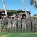 Seabees with NMCB-5's Detail Marshall Islands participate in an island clean-up