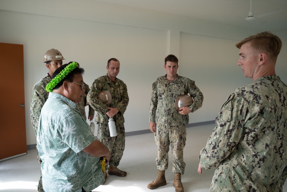 U.S. Navy Seabees with NMCB-5’s Detail Pohnpei attend the closing ceremony of Pehleng Elementary School