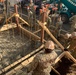 U.S. Navy Seabees with NMCB-5's Detail Atsugi construct a loading dock at the Navy Exchange