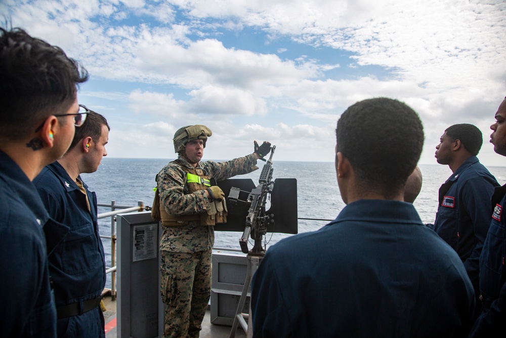 Blue-Green machine gun team: 31st MEU Marines train with Sailors on M240B