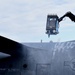 Crew chiefs prepare C-130H for takeoff