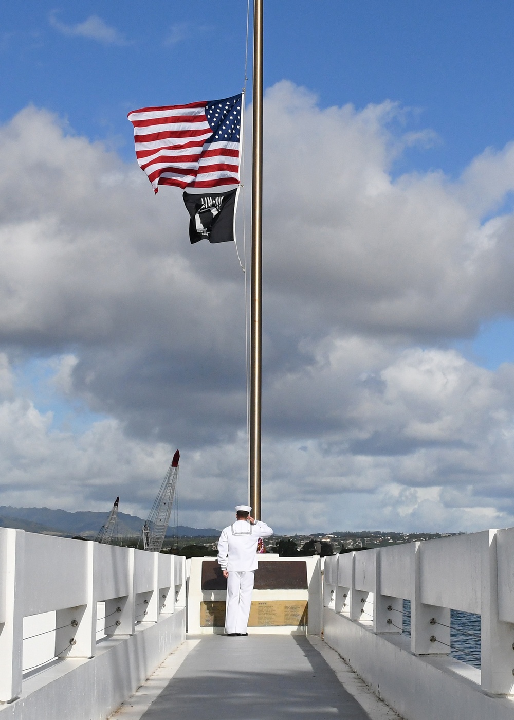 Navy Medical Readiness and Training Command Pearl Harbor Sailor Salutes the U.S. Flag at the USS Utah Memorial