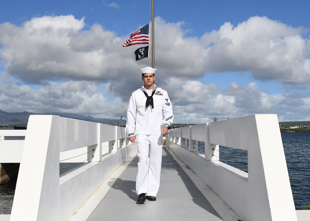 Navy Medical Readiness and Training Command Pearl Harbor Sailor Lowers the Ensign at the USS Utah Memorial