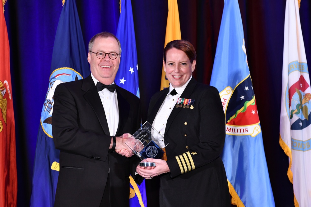 Captain Kim Shaughnessy-Granger receives the Military Health System (MHS) Nursing Leadership Excellence Award