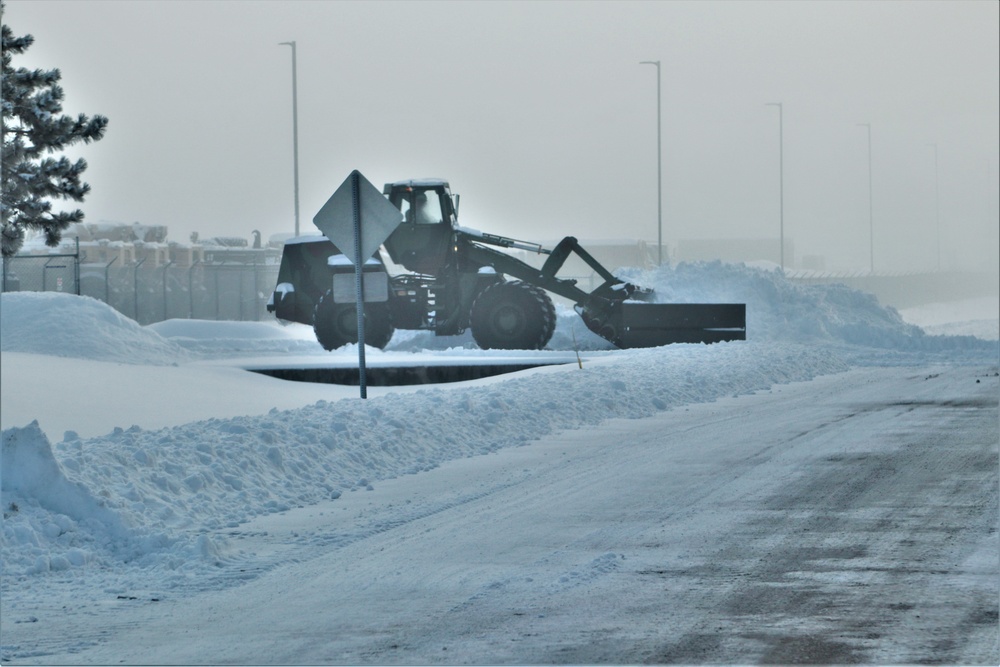 Fort McCoy RTS-Maintenance Soldier moves snow