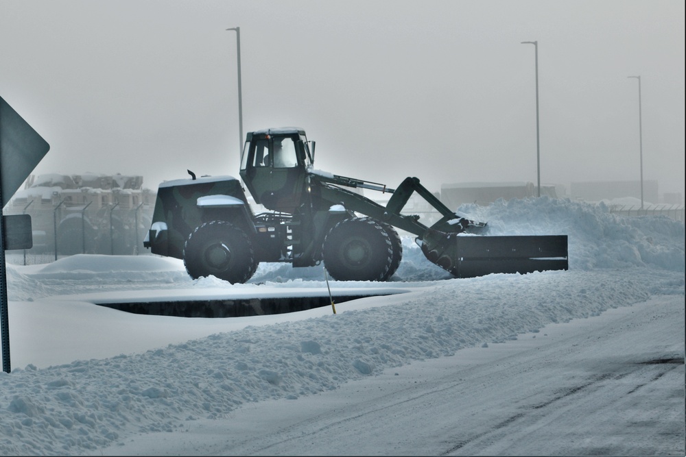 Fort McCoy RTS-Maintenance Soldier moves snow