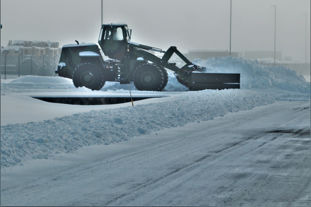Fort McCoy RTS-Maintenance Soldier moves snow