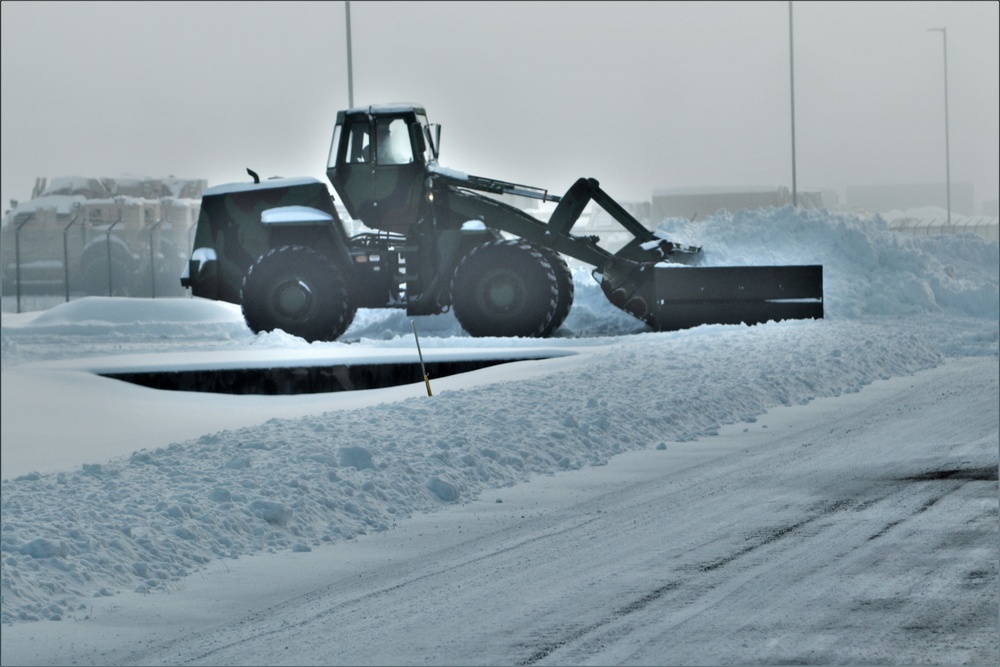 Fort McCoy RTS-Maintenance Soldier moves snow