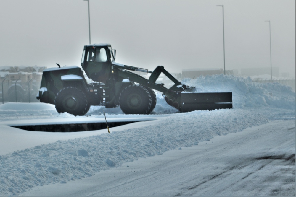 Fort McCoy RTS-Maintenance Soldier moves snow