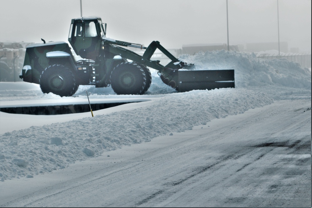Fort McCoy RTS-Maintenance Soldier moves snow