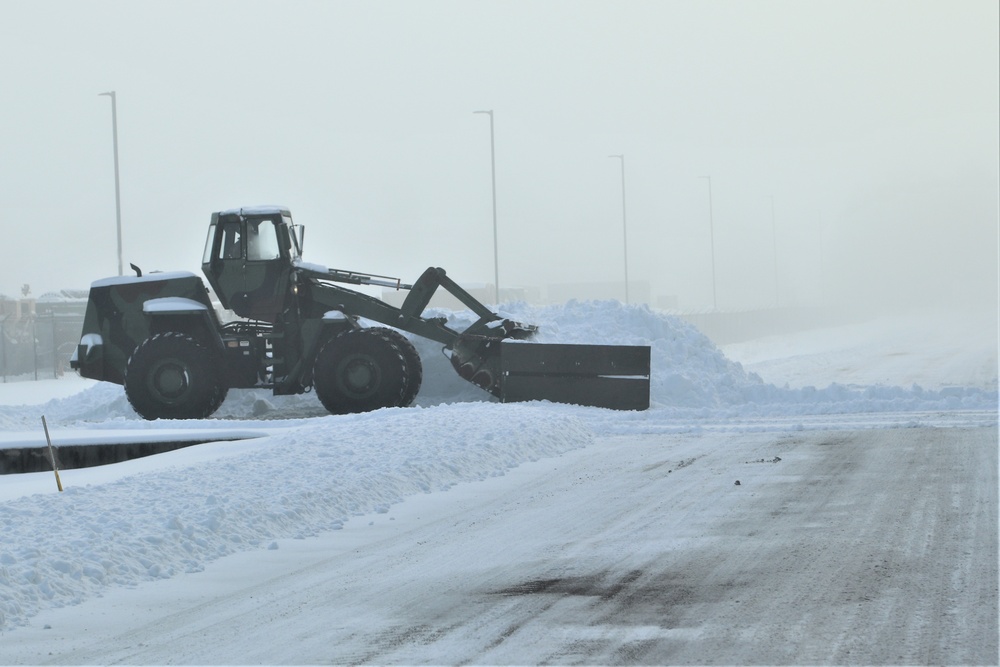 Fort McCoy RTS-Maintenance Soldier moves snow
