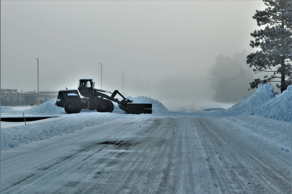Fort McCoy RTS-Maintenance Soldier moves snow