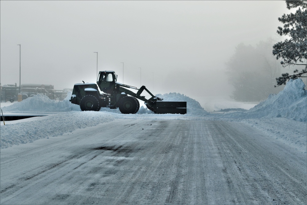 Fort McCoy RTS-Maintenance Soldier moves snow
