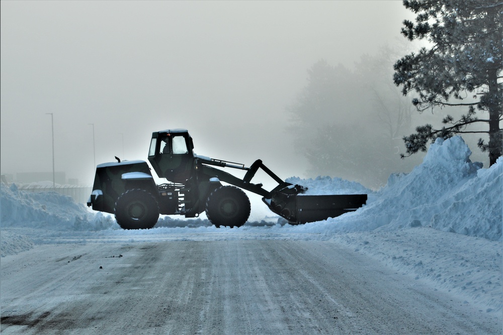 Fort McCoy RTS-Maintenance Soldier moves snow