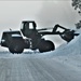 Fort McCoy RTS-Maintenance Soldier moves snow